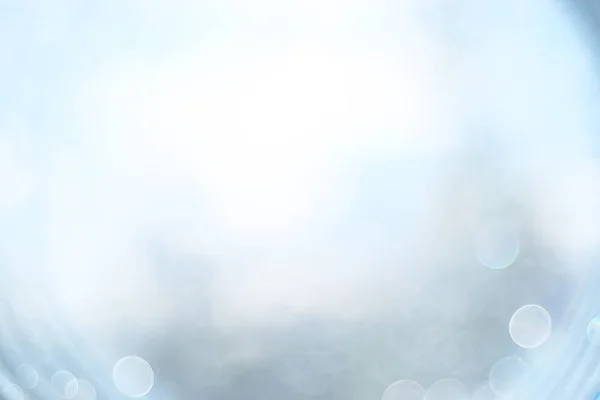 ぼやけたレンズ フレアの抽象的な背景 白と青の光 — ストック写真