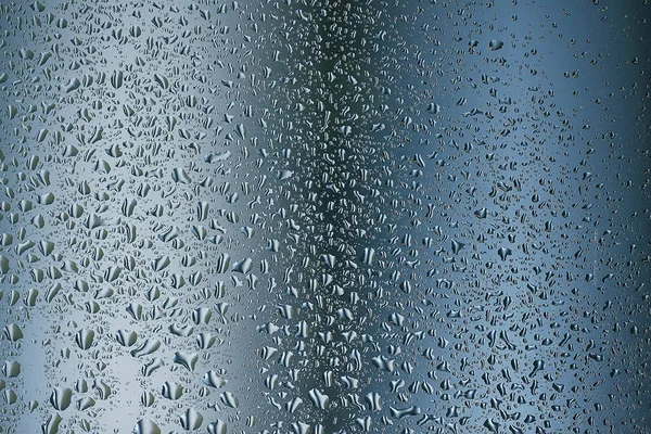 Gotas de lluvia en vidrio de ventana — Foto de Stock