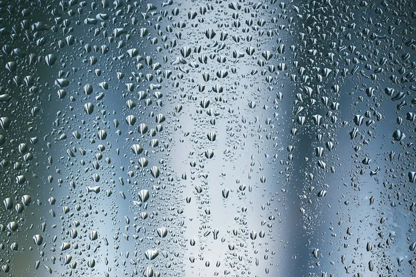 Regndroppar på fönsterglas — Stockfoto