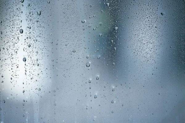 Gotas de lluvia en vidrio de ventana —  Fotos de Stock