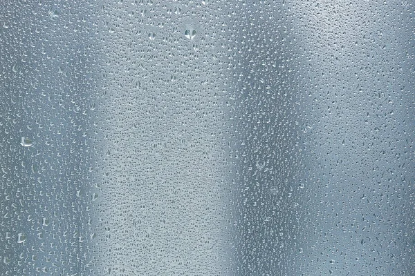 Regentropfen auf Fensterglas — Stockfoto