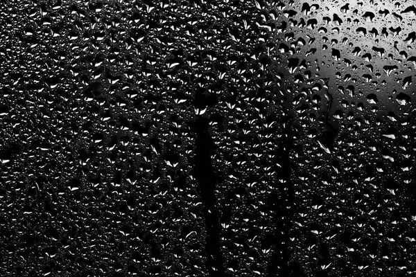 Gotas de lluvia en vidrio de ventana —  Fotos de Stock