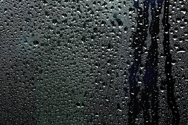 Gotas de lluvia en vidrio de ventana —  Fotos de Stock