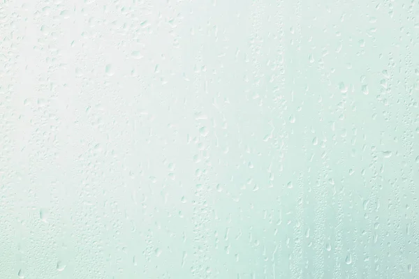 Gotas de lluvia en vidrio de ventana — Foto de Stock