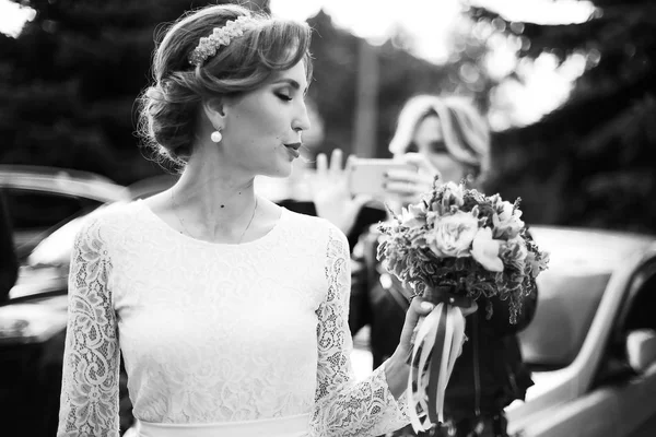 Young bride in white wedding dress — Stock Photo, Image