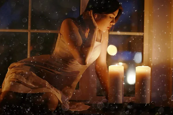 Mumlar ile genç kadın