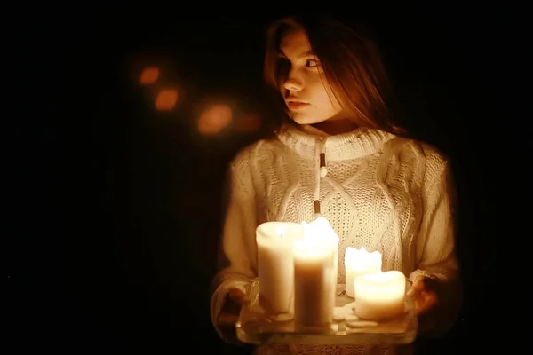 Young woman with candles — Stock Photo, Image