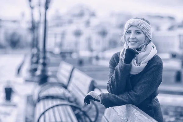 young woman in winter city