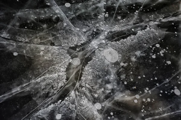 cracked ice texture, abstract seasonal winter cold background, natural ice, broken ice on a lake