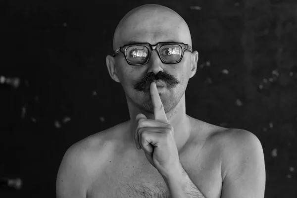 concept man finger mouth secret portrait gesture eccentric bald man