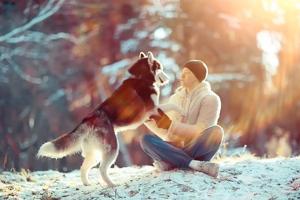 Young Man Hugs Husky Dog Winter Forest Man Dog Hug — Stok fotoğraf