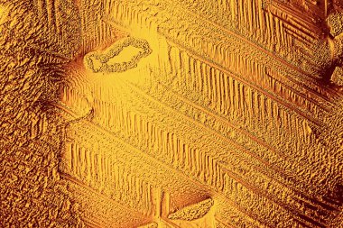 Altın buz arkaplanı, soyut sarı arkaplan, soğuk mevsimlik alışılmadık buz, tatil dokusu