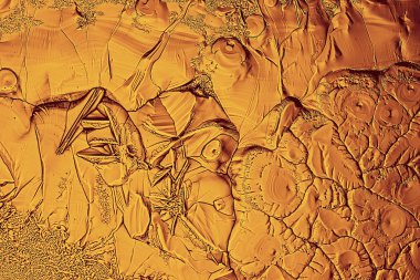 Altın buz arkaplanı, soyut sarı arkaplan, soğuk mevsimlik alışılmadık buz, tatil dokusu