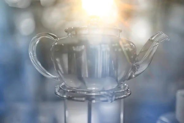 glass transparent teapot tea, cafe tea ceremony, black tea table setting