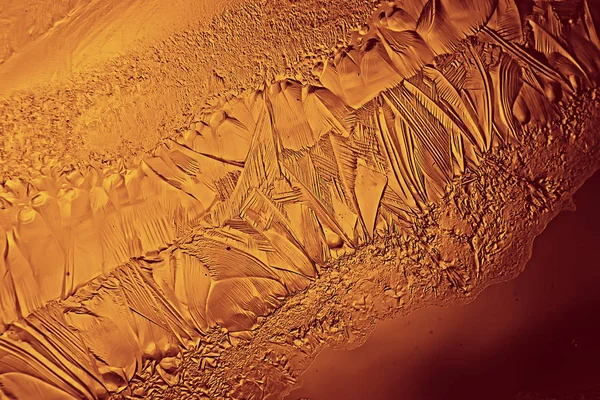 Altın buz arkaplanı, soyut sarı arkaplan, soğuk mevsimlik alışılmadık buz, tatil dokusu