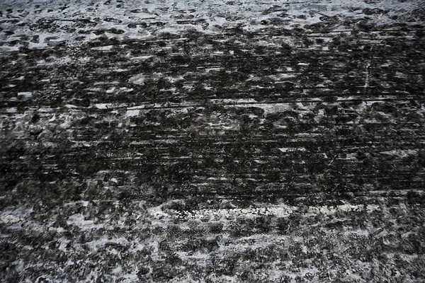 Ślady Śniegu Asfaltowego Lodu Ludzkich Śladów Butów Śniegu — Zdjęcie stockowe