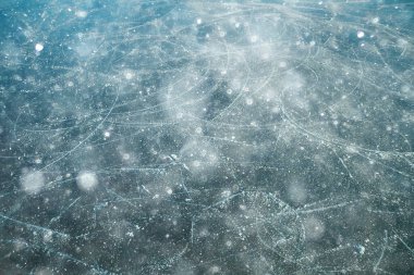 Buz pateni dokusu, soyut arkaplan, hokey patenlerinin hava görüntüsü.