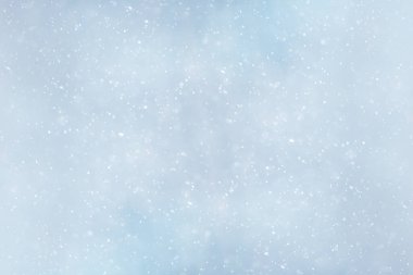 mavi kar yağışı bokeh arkaplanı, soyut kar tanesi arkaplanı bulanık mavi