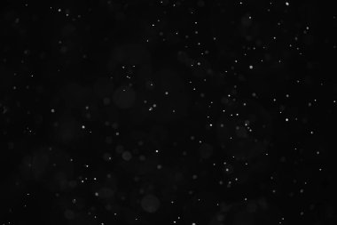 Kar siyah arkaplan soyut dokusu, gökyüzüne düşen kar taneleri