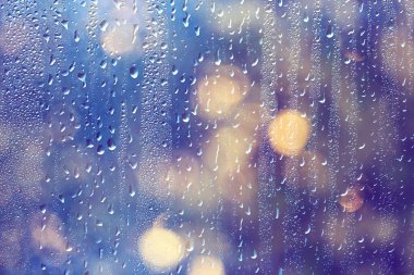 Soyut bahar yağmuru arkaplanı bulanıklaştırdı