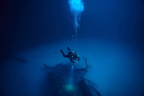 cave diving, diver underwater, dark cave, cavern landscape