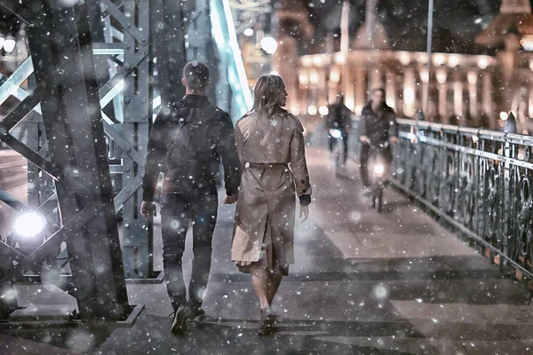 couple in love winter Budapest, tourism Hungary, a young couple a walk around the city in the evening