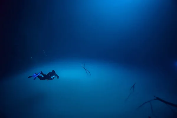 diving in the cenotes, mexico, dangerous caves diving on the yucatan, dark cavern landscape underwater