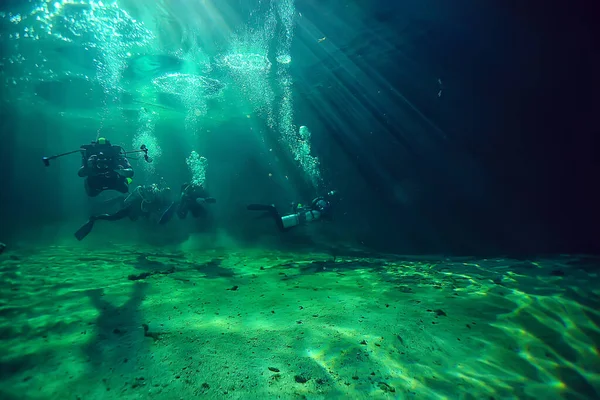 diving in the cenotes, mexico, dangerous caves diving on the yucatan, dark cavern landscape underwater