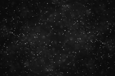 Kar siyah arkaplan soyut dokusu, gökyüzüne düşen kar taneleri