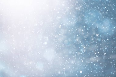 mavi kar yağışı bokeh arkaplanı, soyut kar tanesi arkaplanı bulanık mavi