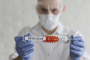 Doktor Coronavirus testi, konsept virüsü, salgın, taklit laboratuvarı biyolojik tehlike