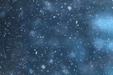 mavi kar yağışı bokeh arkaplanı, soyut kar tanesi arkaplanı bulanık mavi