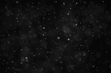 Kar siyah arkaplan soyut dokusu, gökyüzüne düşen kar taneleri