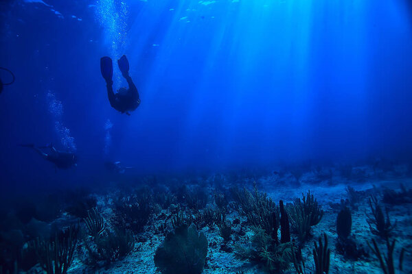 diver underwater unusual view, concept depth, diving in the sea