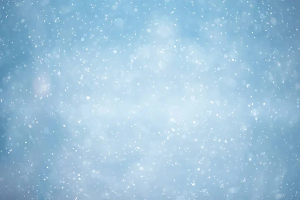 青雪ボケ背景抽象的な雪フレーク背景の青 — ストック写真