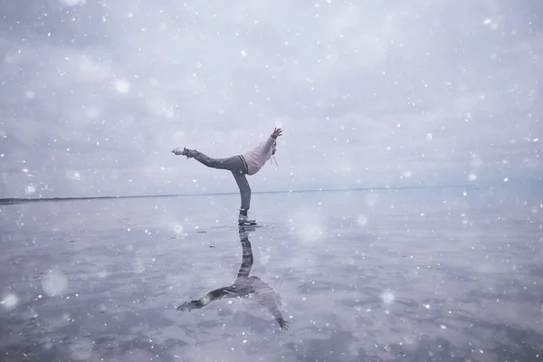 one guy skates on the ice of a frozen lake, nature landscape, man outdoor sports