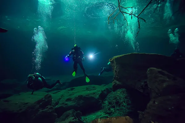 diving in the cenotes, mexico, dangerous caves diving on the yucatan, dark cavern landscape underwater