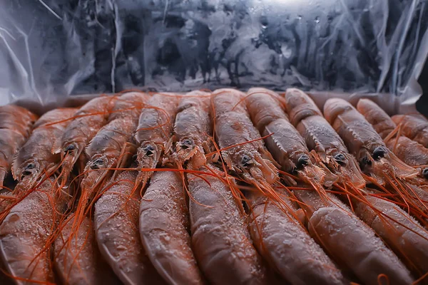frozen king prawns, macro background seafood, fresh red prawns