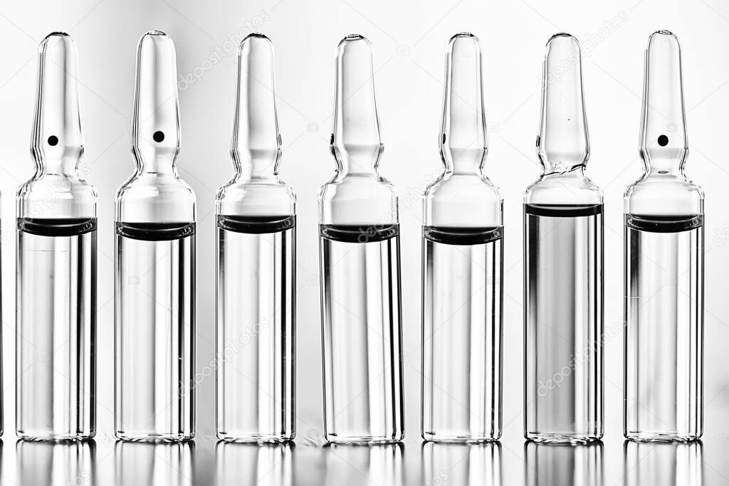 ampoules medicine vaccine concept, abstract background, vaccination virus protection