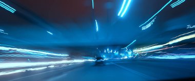 Gece şehrinin soyut görüntüsü bir araba penceresinden bulanık, şehirde trafik...