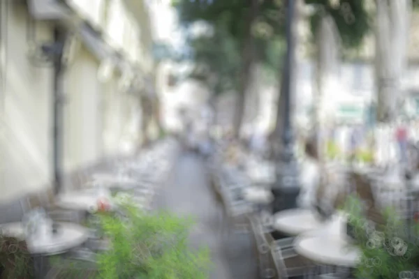 城市模糊的背景 夏日的阳光 在欧洲抽象的休假日 — 图库照片