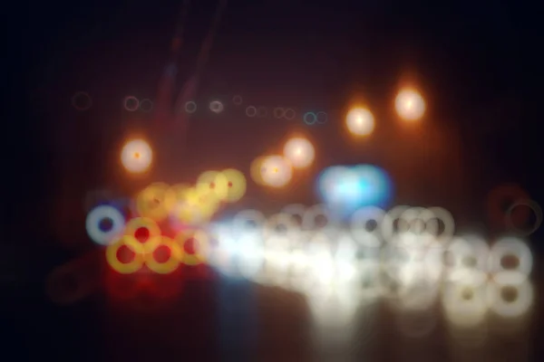 車の窓からの夜景の抽象的なぼやけ街の交通 — ストック写真