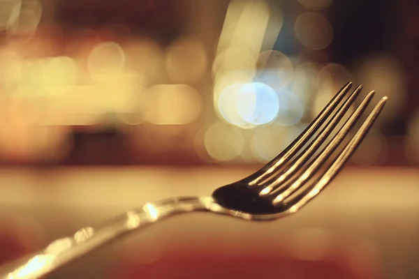 abstract background, restaurant concept blurred background evening food fork, knife, cutlery, table setting