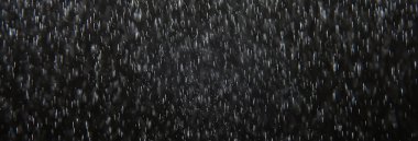 Siyah yağmurun örtülmesi için arka plan, soyut stüdyo su damlalarını düşürür