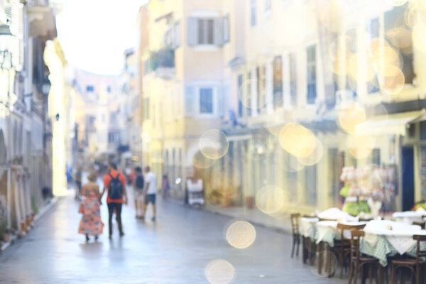 Urban blurred background, summer sun bokeh abstract active vacation holidays in europe