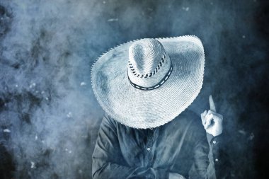 farmer hipster in a straw hat with brim in smoke smoking tobacco retro style wild west sambrero clipart