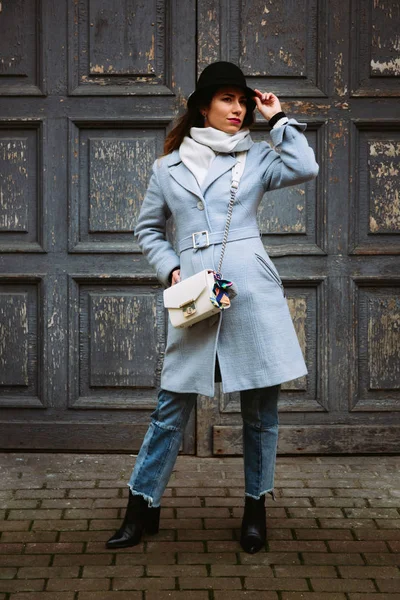 Outdoor full body portrait of young beautiful fashion girl posing on street. Model looking aside. Lady wearing stylish winter clothes. Female fashion. Toned — Stock Photo, Image