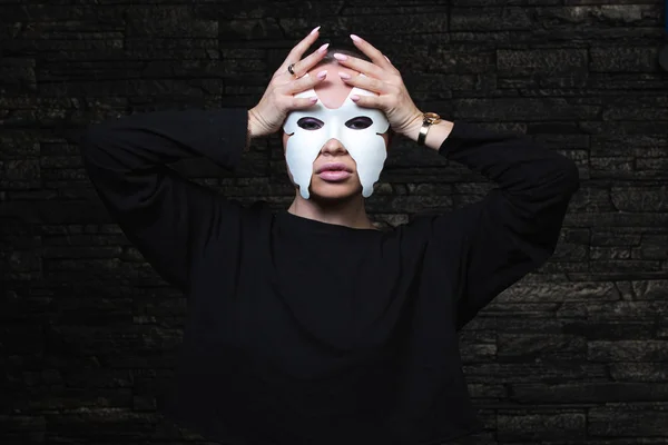 Shaved young model in mask