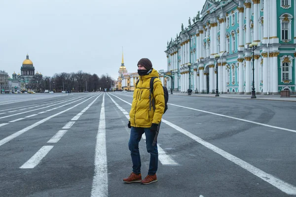 Side View Young Man Yellow Jacket Standing Road Empty Dvortsovaya — Stock Photo, Image