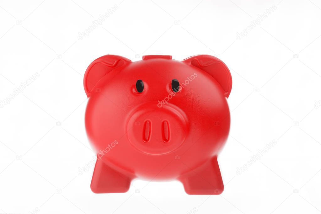 Red piggy bank isolated on white background.